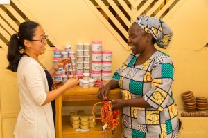 Gina Li is a 2013-2014 YAMEN! participant serving with MCC partner Homemakers in Jos, Nigeria. Gina comes from China, loves serving in Nigeria, and has embraced both Homemakers and the Hausa language. Gina works with Margaret Ahmed (pictured with Gina), the Executive Director of Homemakers, doing accounting, writing blogs, developing new crafts and working with women. YAMEN is a joint program of MCC and Mennonite World Conference for young adults from countries other than Canada and the U.S. that places emphasis on expanding the fellowship among Anabaptist churches and developing young leaders around the globe. (MCC Photo/Dave Klassen)